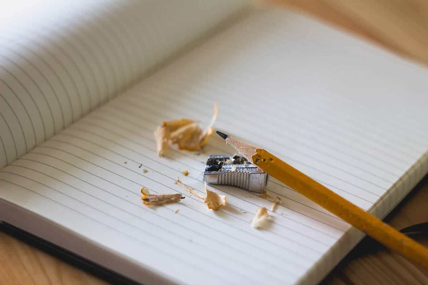 Pencil shavings on an open notebook